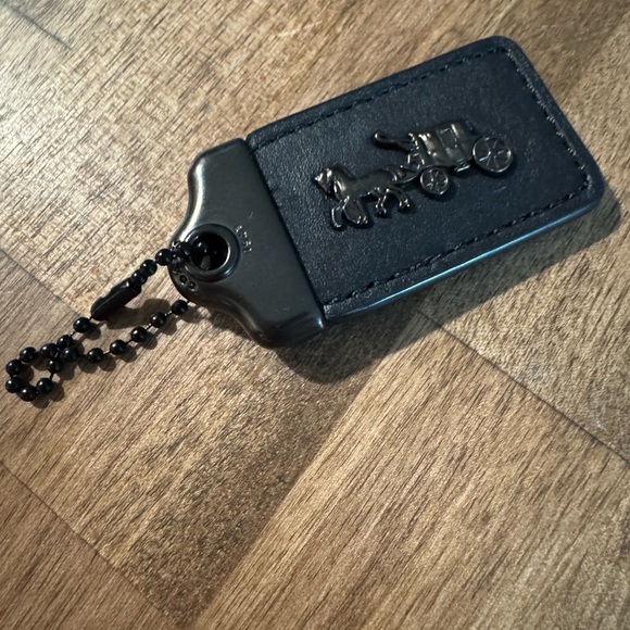 Coach Bag Tag in black and Burgundy with Metal Carriage Design - Picture 1 of 2